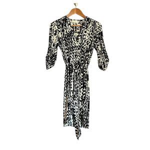 3 for $30! Renee C. Patterned belted dress